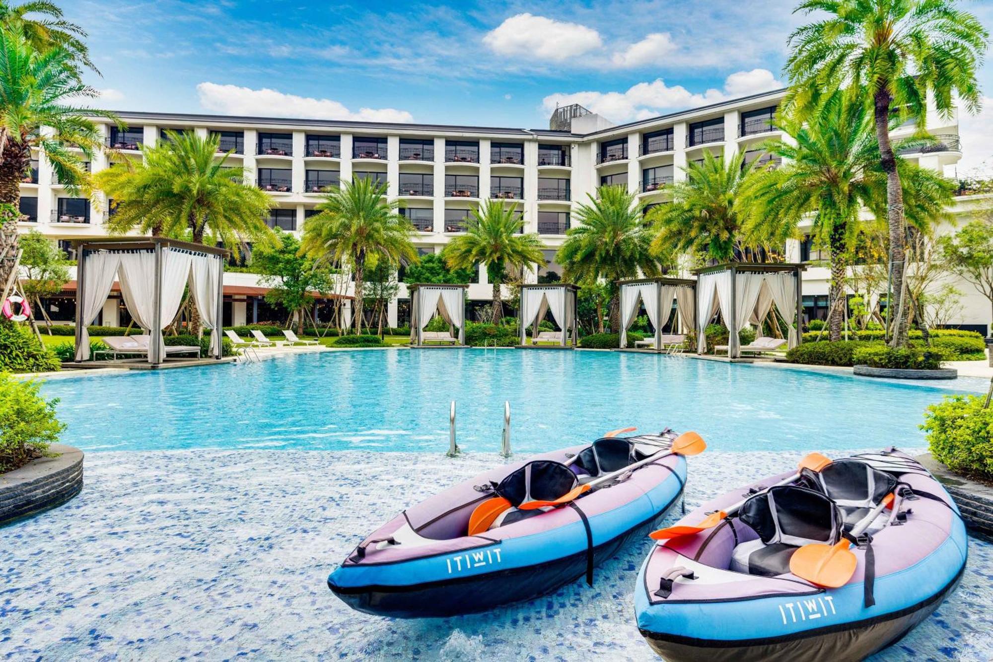 ザ ウェスティン ダーシー リゾート タオユェン 大渓区 エクステリア 写真 The swimming pool at the hotel